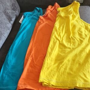 Avon Vibrant Tank Tops in Yellow, Orange, and Blue